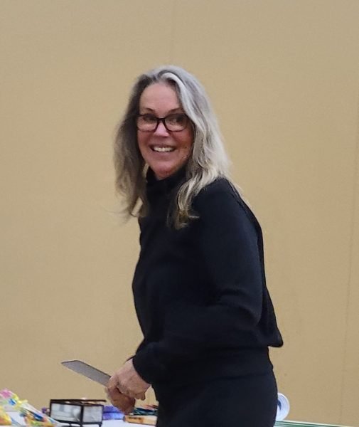 A woman smiling at the camera