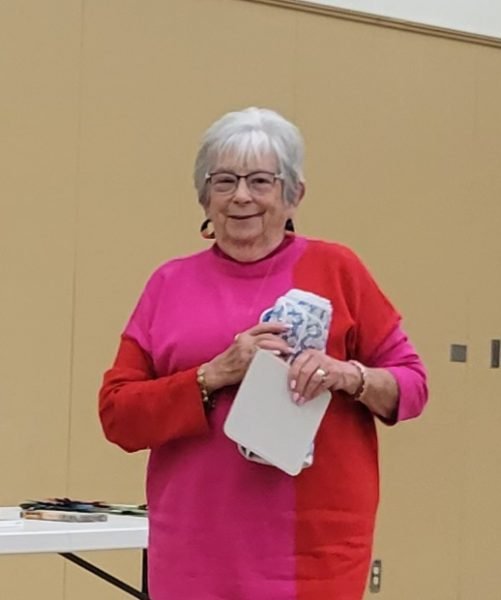 A woman smiling at the camera