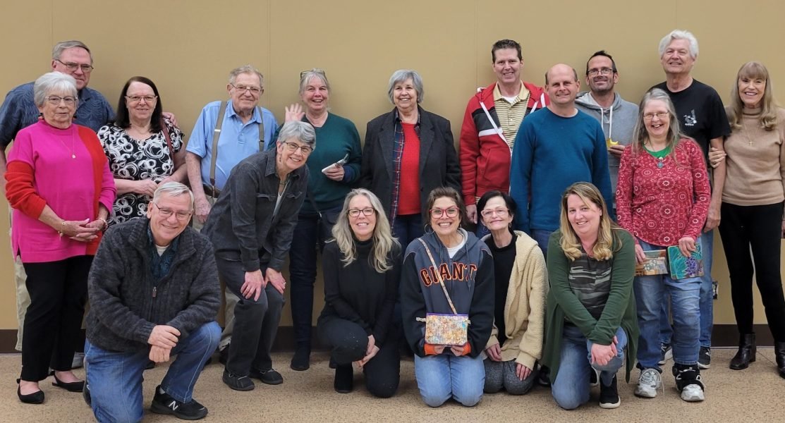 A group of people lined up for a photo